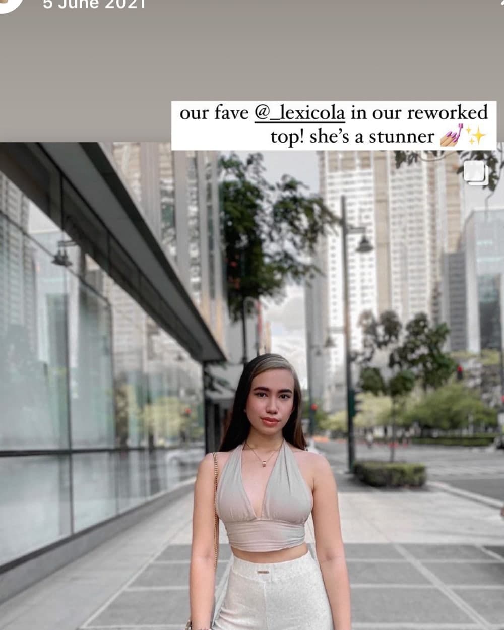A customer in a doce reworked halter top on a city street